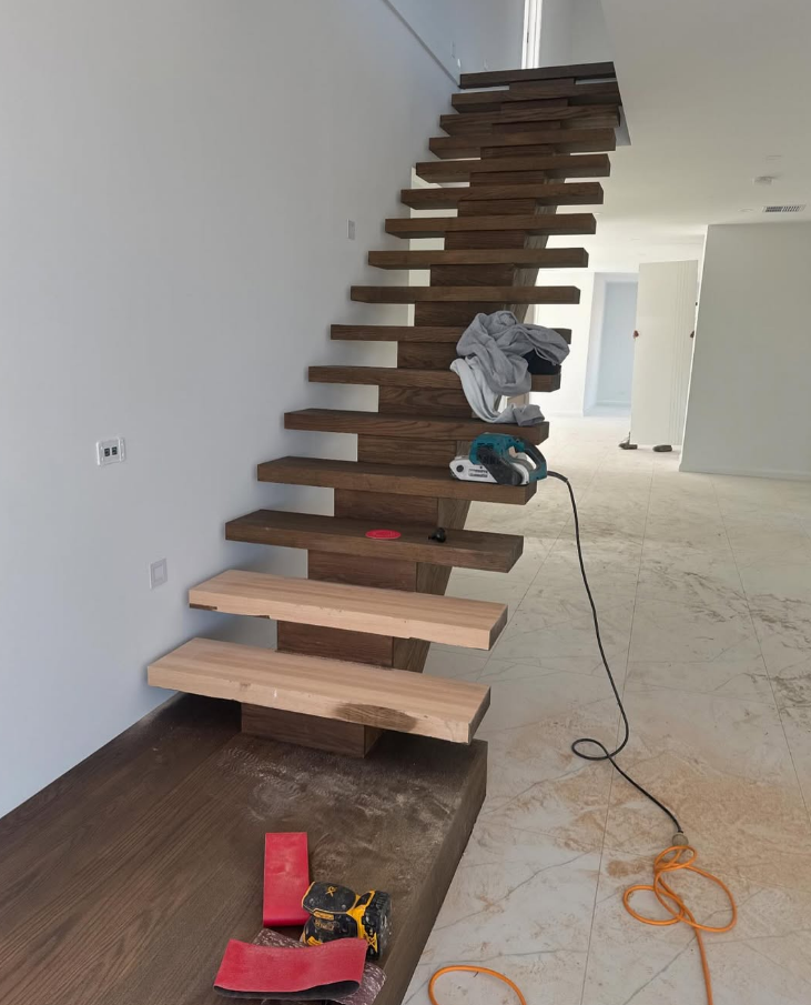 Modern floating cantilevered timber staircase