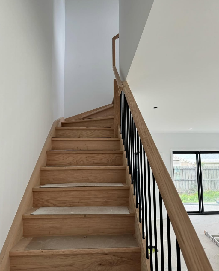 Oak treads with black metal balusters